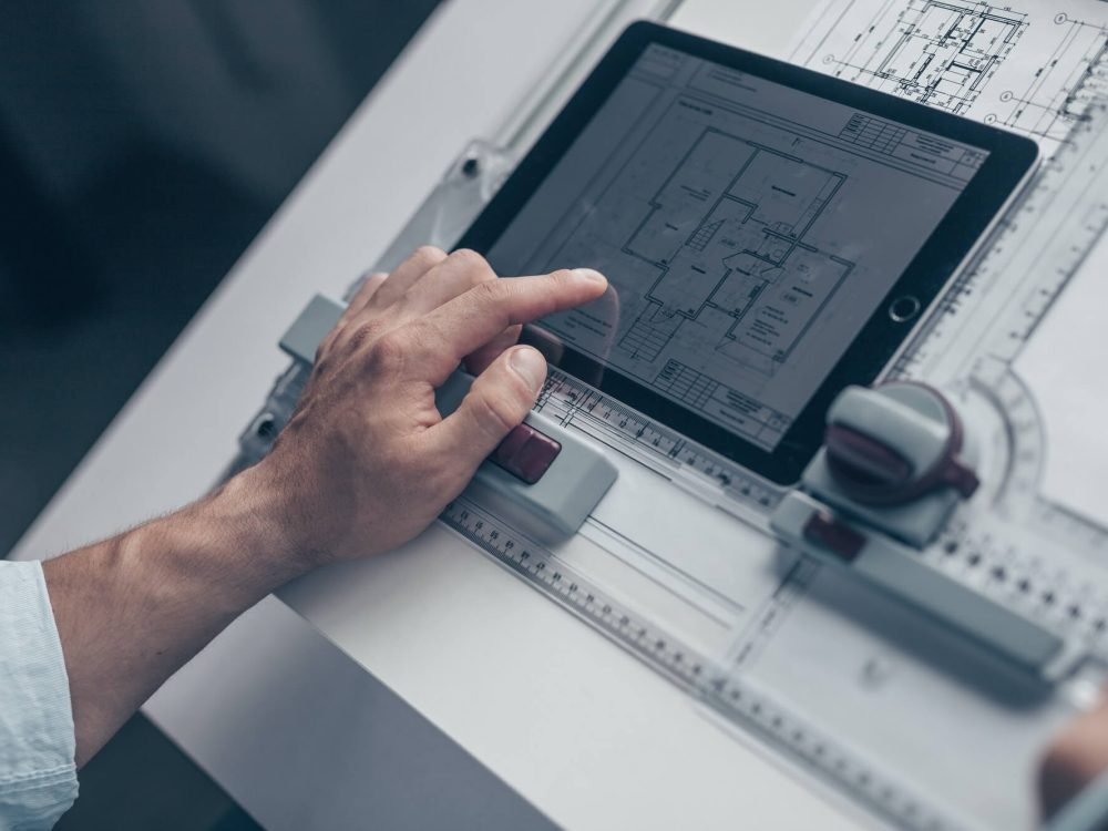 architect-with-drawing-1.jpg architect-with-drawing-1.jpg